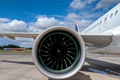 a large jetliner sitting on top of an airport tarmac